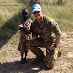 Mark Wilson with African child